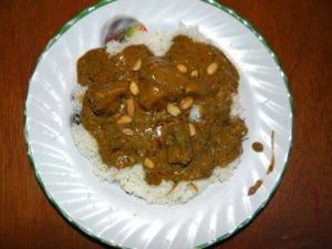 Peanut sauce dish with local eggplant and goat meat