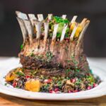 Lamb Crown Roast recipe plated on a serving dish.