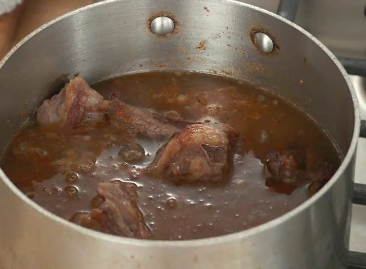 Bone-in goat meat cooking