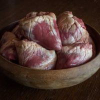 A bowl of corned lamb hearts ready to cook.