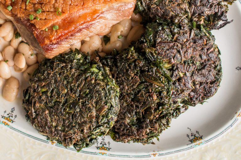 Roast Rack of Goat Recipe with Green Cakes and Beans