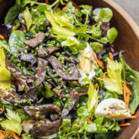 Salted lamb liver salad with balsamic vinegar and eggs