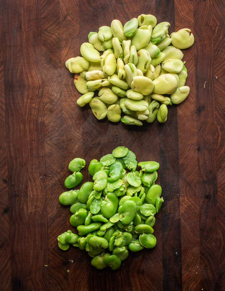 Shelling cooked fava beans
