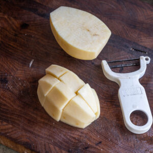 cutting a peeled potato